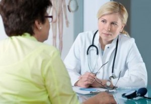 a woman during a visit to a doctor